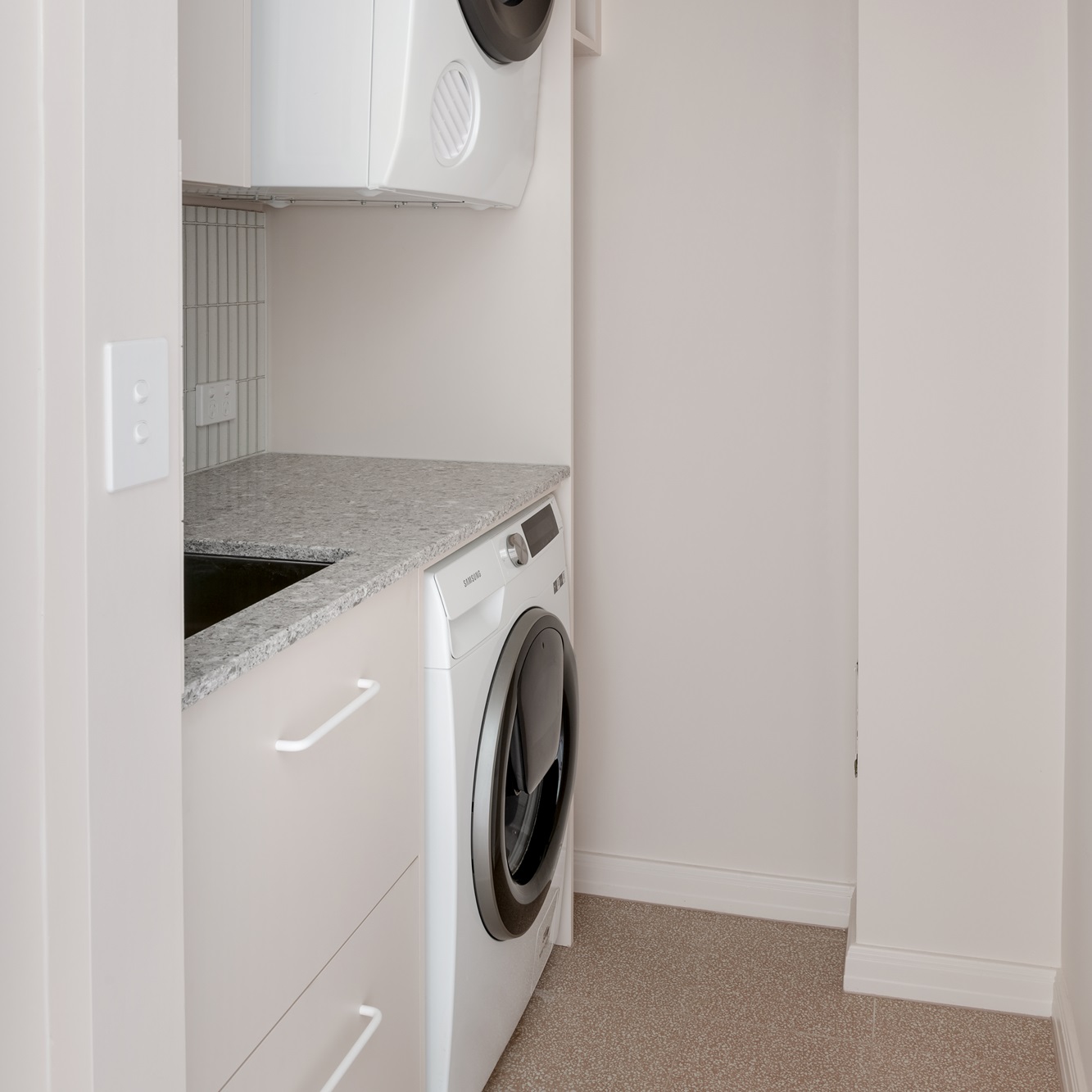 small laundry with appliances in our renovation Elwood