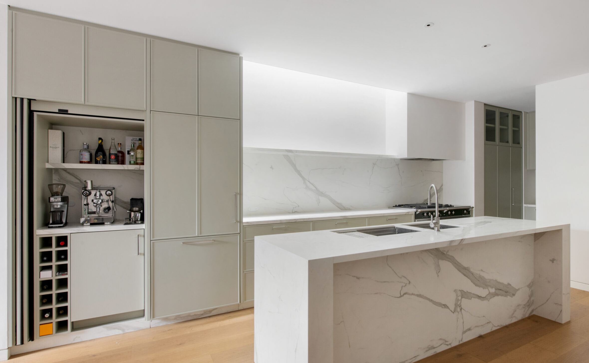 89 Milswyn Street South Yarra kitchen with cupboards and mini bar and coffee station with island bench
