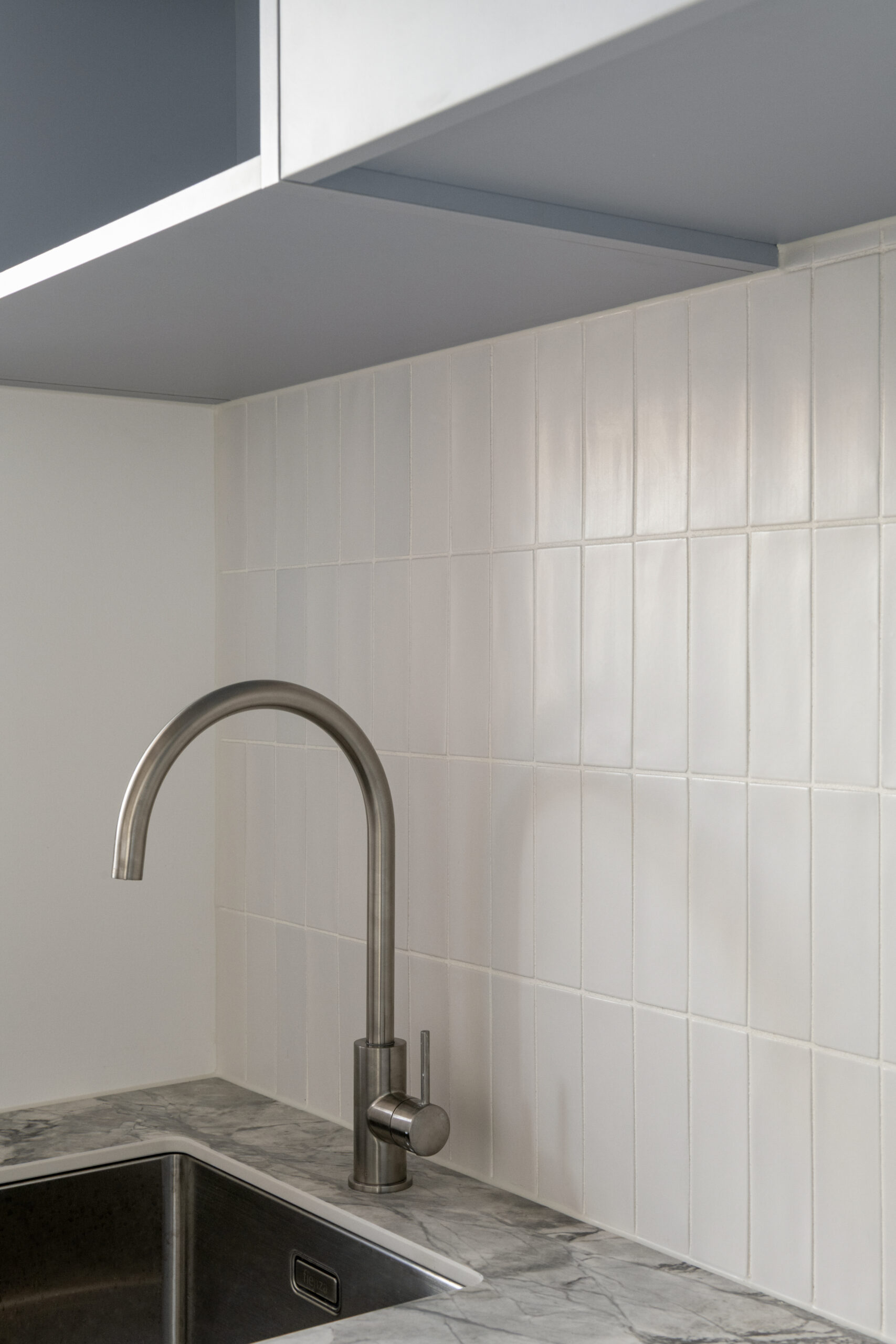 Sunderland Street Malvern East, laundry with basin and tape with tiles behind